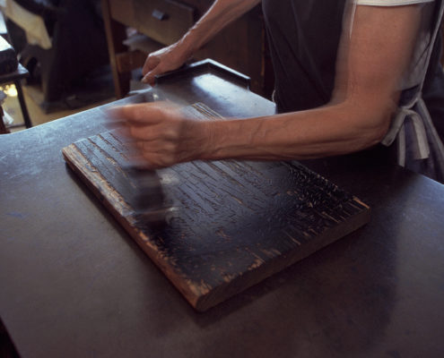 inking the block hand press