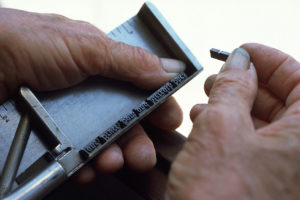 setting type printing press